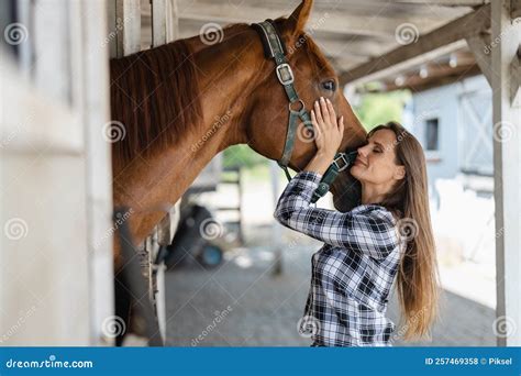 teen fucked by horse|Teenage Girl Taking Care of Horse in Stable